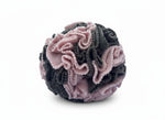 Close-up of Sniffing Ball Dark Pink texture and folds for treat hiding