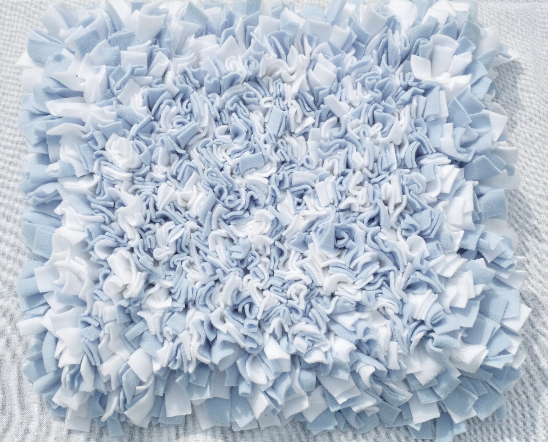 Sniffing Mat Light Blue - The Woof ToysSniffing Mat Light Blue supporting calm mealtime enrichment